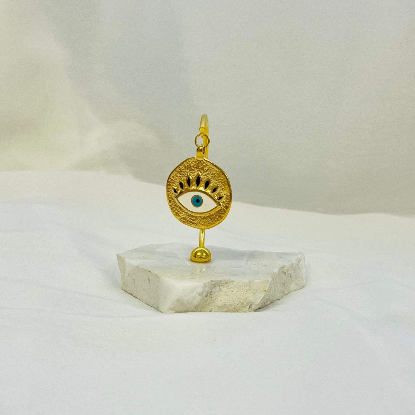 Evil Eye Gold Amulet Plated on White Marble – My Christening Box (Front View)