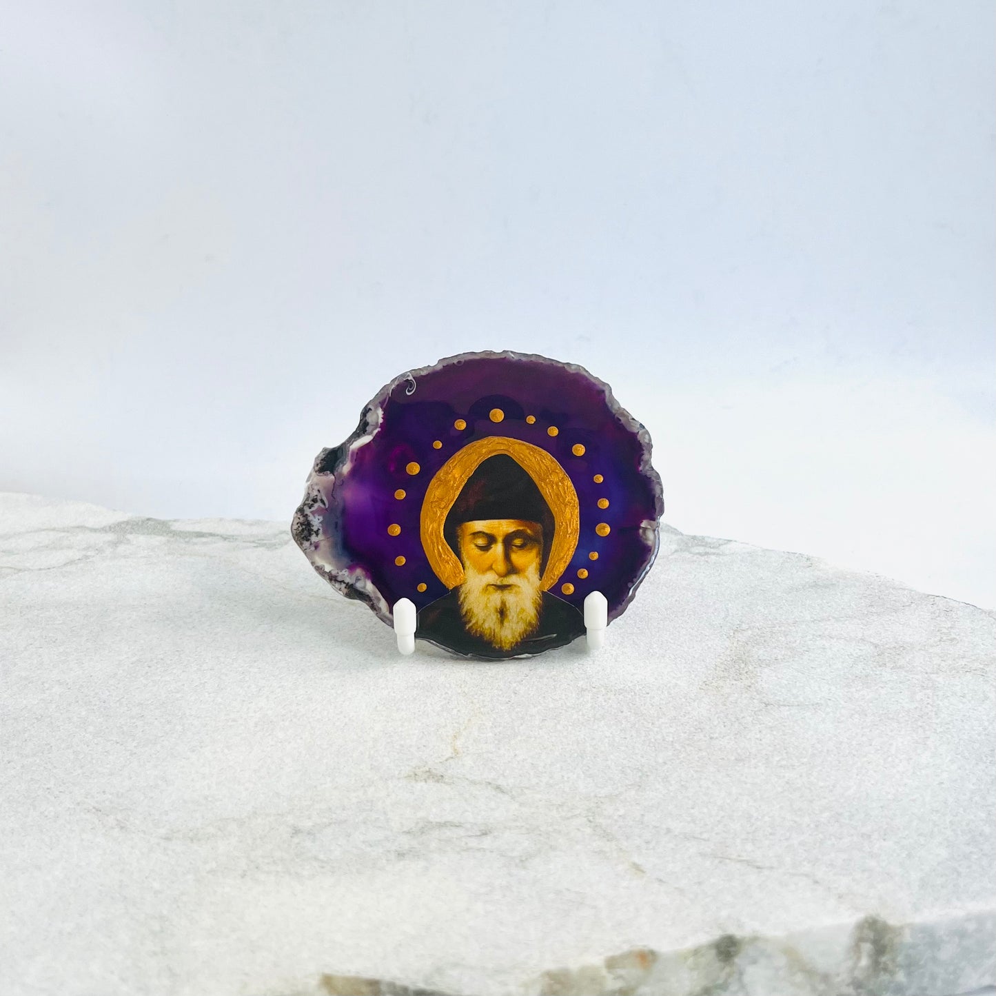 Saint Charbel Maronite Icon is carefully handcrafted on Brazilian Crystal Agate, covered with a clear hypoxy resin.