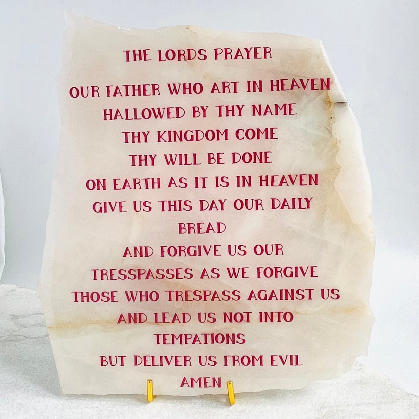The Lords Prayer icon is carefully handcrafted on Pink Onyx, covered with a clear hypoxy resin.