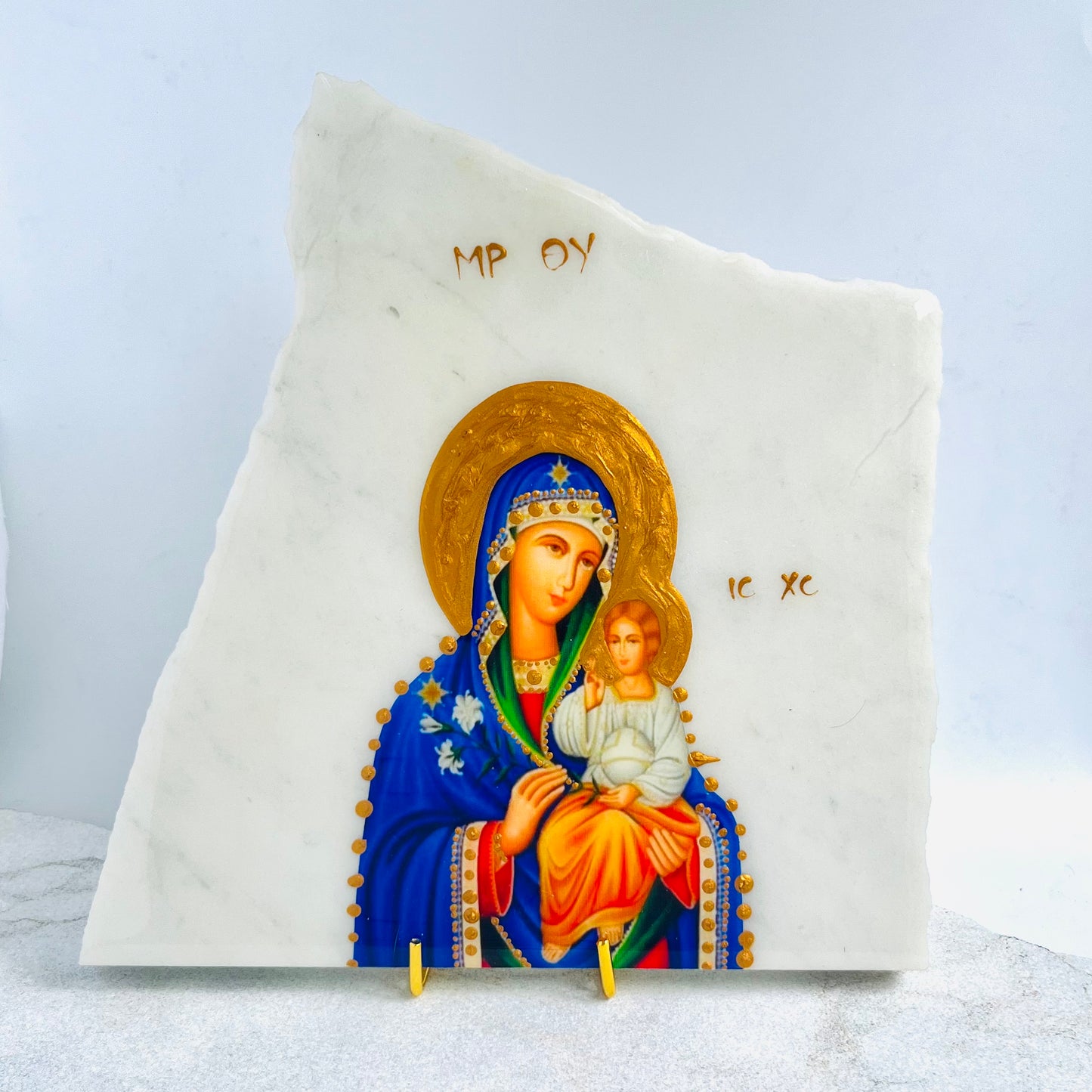 Panayia with Xristo icon is carefully handcrafted on Carrara Marble