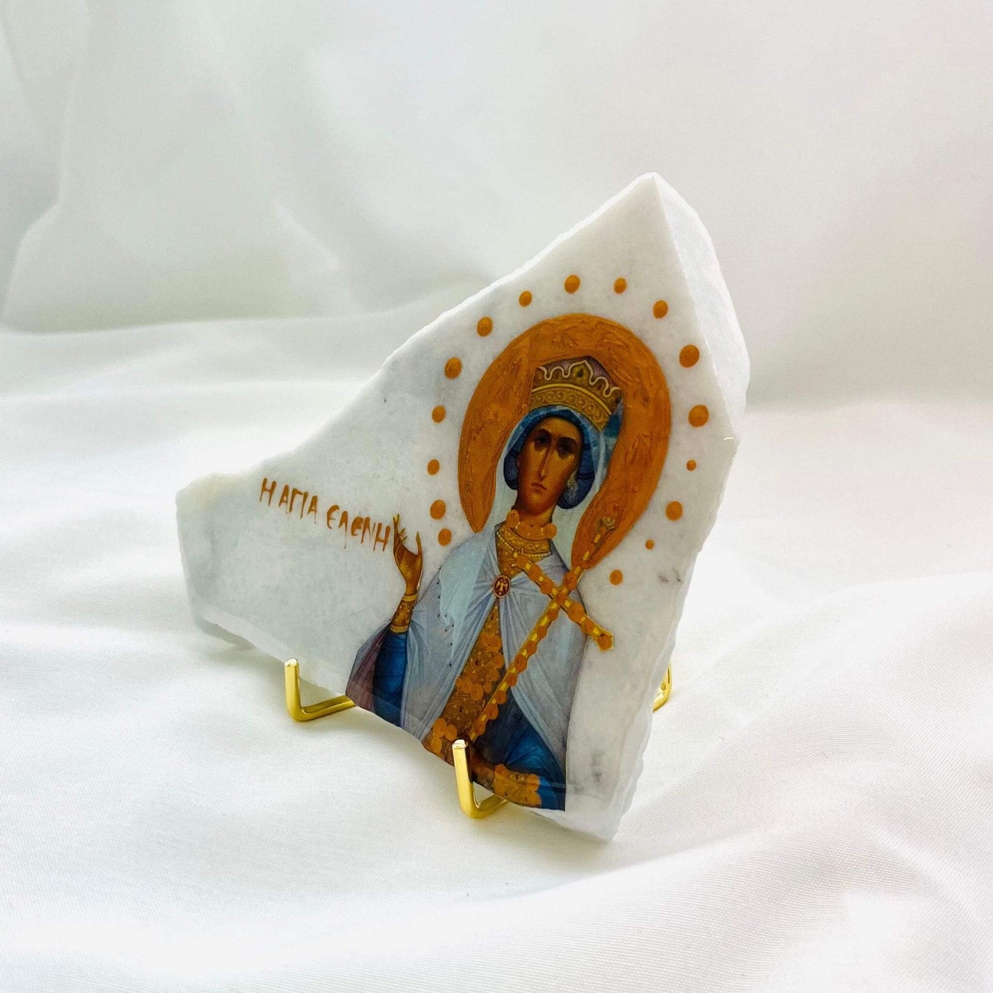 Agia Eleni / Saint Eleni icon is carefully handcrafted on Cararra Marble, covered with a clear hypoxy resin.  Comes with a gold stand.